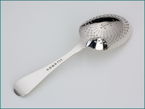 Zilveren natfruitlepel met parelrand uit 1899-7185