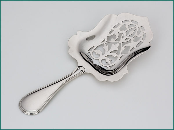 Zilveren dubbelrond natfruitschep uit 1877-0