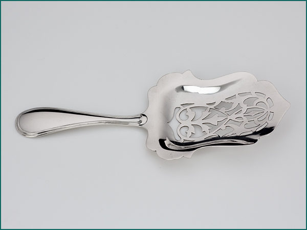 Zilveren dubbelrond natfruitschep uit 1877-7954