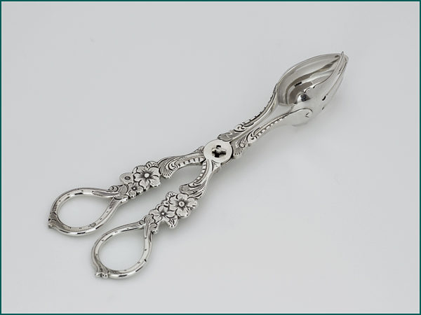 Zilveren zuur/komkommertangetje uit 1871-6861