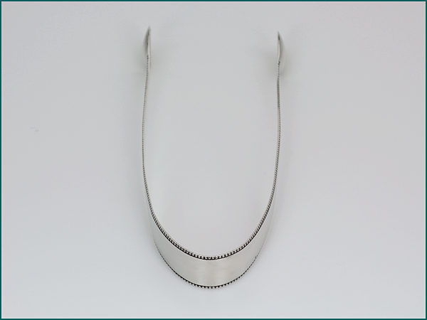 Zilveren kandijtang met parelrand uit 1801-9070