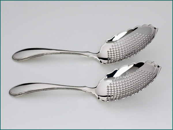 Zilveren natfruitschep met parelrand uit 1889-7627