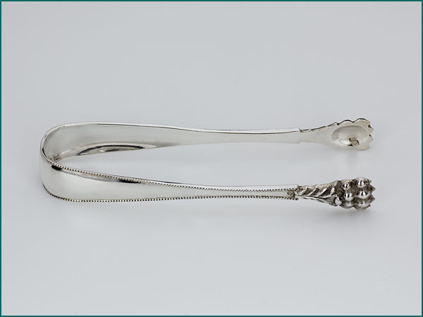 Zilveren (ijs)klontjestang uit 1886-7099