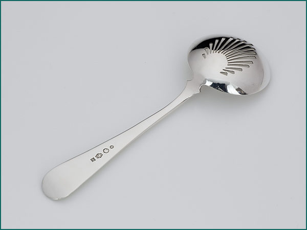 Zilveren natfruit/strooilepel uit 1919-7544