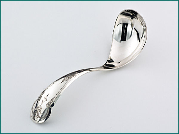 Zilveren compotelepel met gravering uit 1882-0