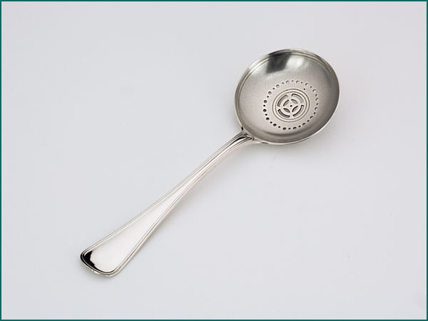 Zilveren dubbelrond natfruitlepel uit 1912-0