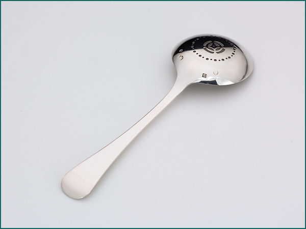 Zilveren dubbelrond natfruitlepel uit 1912-6626