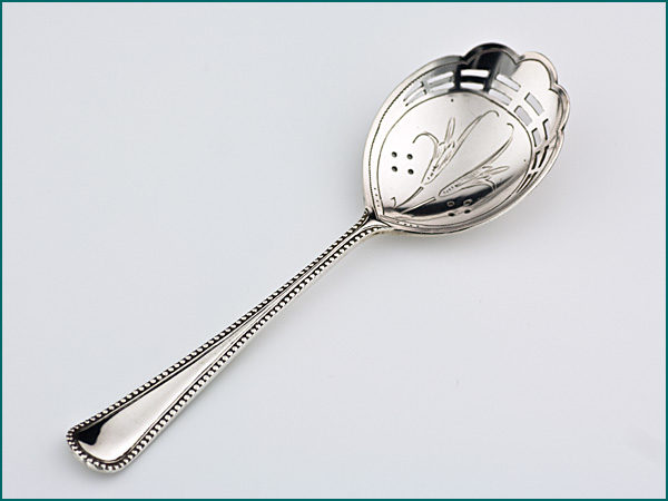 Zilveren natfruitschepje met parelrand 1906-1908-0