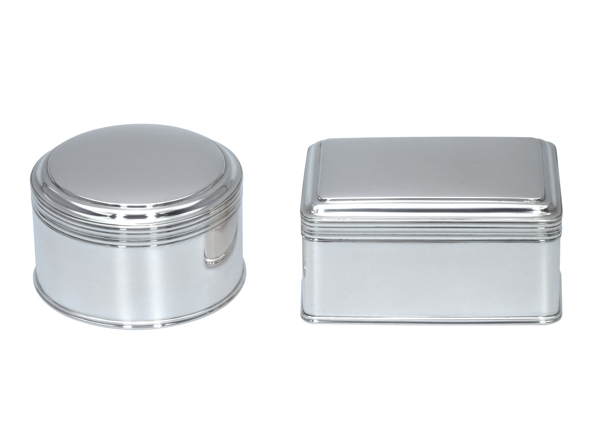 Stel zilveren koektrommels uit 1870